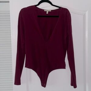 Express deep plunge body suit size L